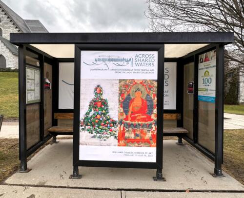 Wide-format bus stop shelter banner sign for current museum exhibition.