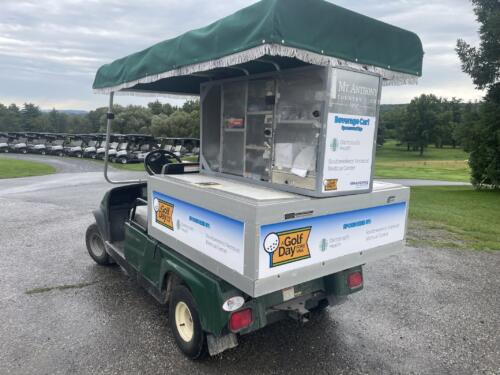 Beverage golf cart with sponsor logos printed on vinyl decals for fundraising event