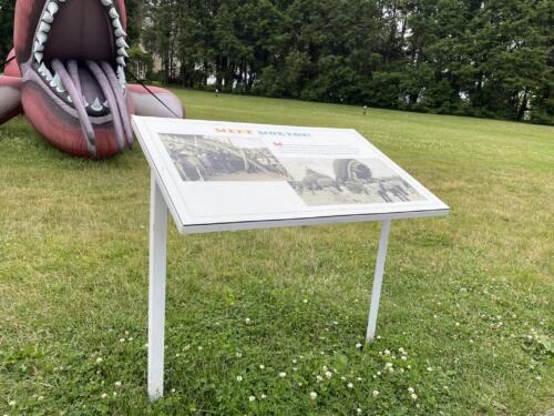 Outdoor custom fabricated metal stand and printed panel for museum sculpture