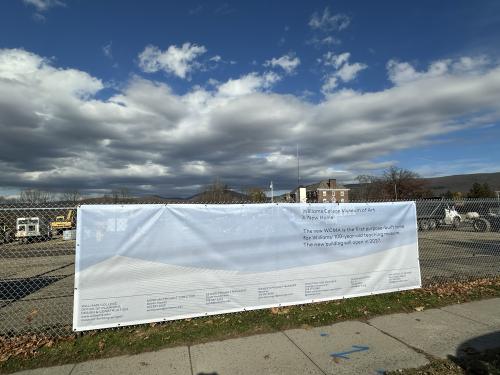 Large scale banner providing information of ongoing construction.