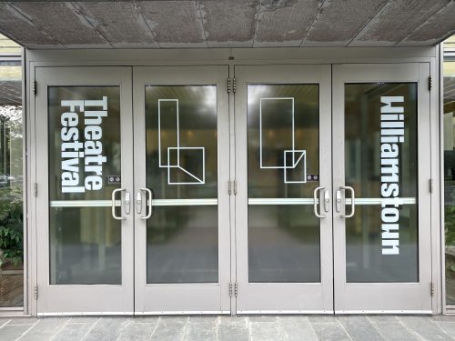 White ink printed on clear vinyl applied to the doors of the building hosting the Williamstown Theatre event