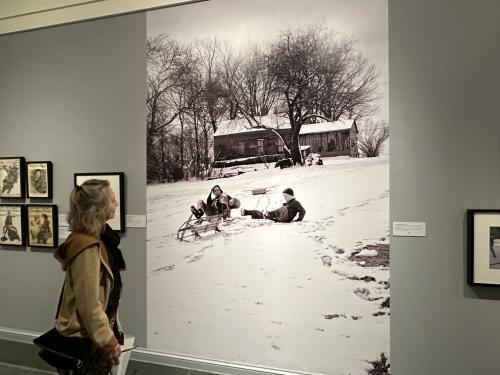 Classic Black and White photography provides context for a larger exhibit.