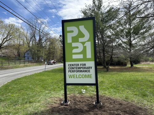 Framed sign at entrance to facility.