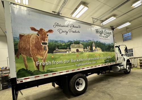 Partial box truck wrap with spot graphics and lettering